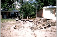 Neighborhood ruined by flooding, June 16, 1957 (095-022-180)